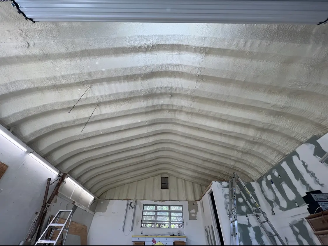 Spray polyurethane foam applied to the underside of a metal roof deck in Hamden